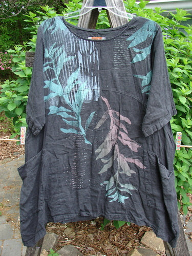 Barclay Linen Two Pocket Urchin Dress Falling Branch Black Size 1, featuring a rounded neckline, sectional panels, downward curved empire waist, varying side lengths, and three-quarter sleeves, epitomizes BlueFishFinder's vintage style.