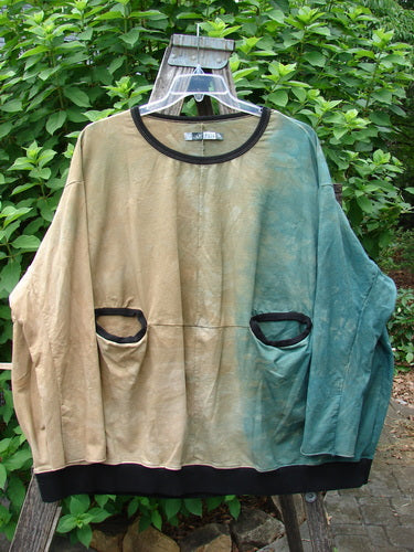 Barclay Cotton Lycra Open Rib Pocket Pullover Mottled Forest Sunset OSFA displayed on a wooden stand, illustrating BlueFishFinder.com's commitment to offering unique, expressive vintage clothing by Jennifer Barclay.