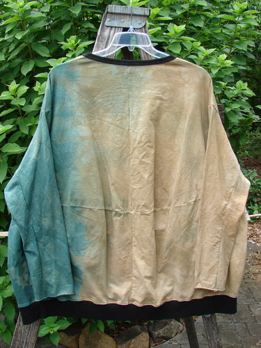 Barclay Cotton Lycra Open Rib Pocket Pullover Mottled Forest Sunset OSFA displayed on a swinger, highlighting its unique rib texture and practical pocket design, embodying Blue Fish Clothing's vintage-inspired creativity.