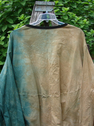 Barclay Cotton Lycra Open Rib Pocket Pullover Mottled Forest Sunset OSFA displayed on a hanger, showcasing its long sleeves and ribbed texture. Perfect for expressing individuality through vintage style from Bluefishfinder.com.