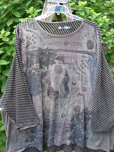 Barclay Modernist High Low Top Fantastic Dream Black Grey Stripe OSFA displayed on a hanger, showcasing its distinctive high-low hem and striped pattern, embodying creative freedom and individuality from Bluefishfinder.com.