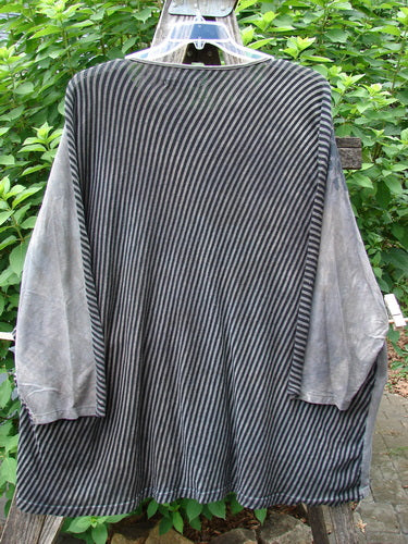 Barclay Modernist High Low Top Fantastic Dream Black Grey Stripe OSFA displayed on a hanger, showcasing its distinctive high low hemline with a front length of 29 inches and back length of 33 inches.