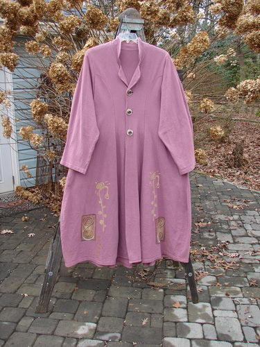 1996 Reprocessed Equinox Coat, Petunia, Size 2: A pink coat with vintage buttons, a widening lower bell shape, and tabbed and gathered rear pleats.