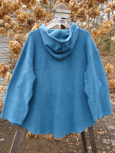 Image alt text: Barclay Celtic Moss Swing Hoodie Jacket in Dusty Teal, Size 2, on a swinger with a cozy hood, A-line shape, and front drop pockets.