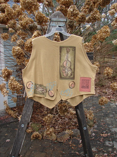 1995 Cottage Vest with musical theme and ceramic buttons, in burnished gold, perfect condition.
