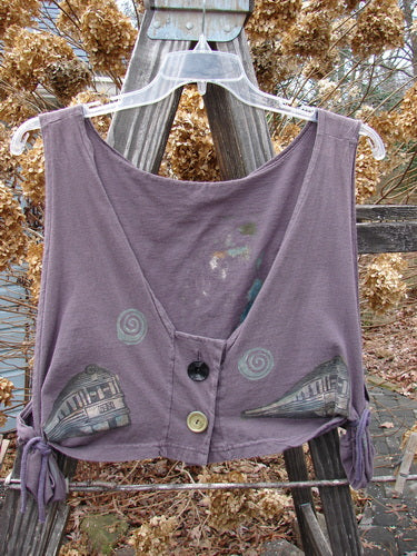 1994 Cornice Vest with train-themed paint and a deeply squared neckline. Perfect condition purple shirt with a tie and design.