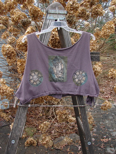 1994 Cornice Vest featuring a train-themed fabric design on a purple shirt with dippy sides and a squared neckline. Perfect condition.