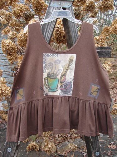 1992 Peplum Top with Steaming Soup Design: Brown tank top featuring spoons, bowl, and a cup and spoon painting. Unique vintage piece from Blue Fish Clothing's Summer Collection.