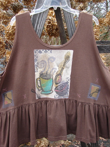 1992 Peplum Top Steaming Soup Mushroom OSFA: Brown tank top with a teacup and spoon design. Baby doll style with wide waist and gathered bottom flounce.