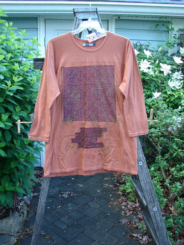 Barclay NWT Long Sleeved Studio Tee Primitive Metallic Ember Size 0, featuring a straight shape, long sleeves, and rounded neckline with a holiday primitive metallic theme, showcasing BlueFishFinder's unique vintage style.
