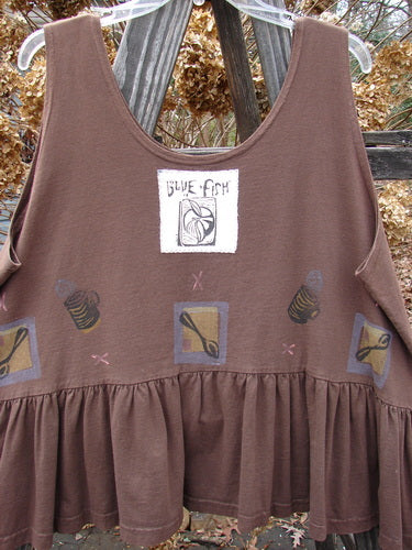 Image alt text: 1992 Peplum Top Steaming Soup Mushroom OSFA: Brown dress with logo, baby doll style, wide waist, flounce bottom.