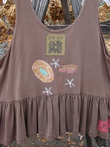 Image alt text: 1992 Peplum Top Magic Chair Mushroom OSFA - Brown tank top with a design and patch, featuring a yoked waist seam, rounded neckline, wide waist, and gathered bottom flounce.