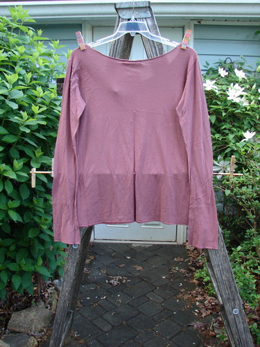 Barclay NWT Modal Batiste Layer Top in Desert Rust, showcasing long narrowing sleeves, raw edges, a rounded neckline, and slight A-line flair, reflecting Bluefishfinder.com's vintage, creative style.