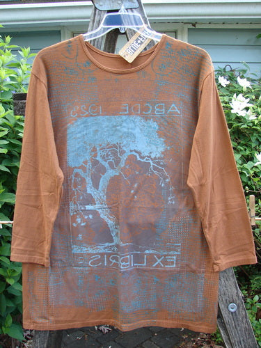 Barclay NWT Long Sleeved Studio Tee ABC Tree Ochre Size 0 features a straight shape, cozy long sleeves, and a rounded neckline with an ABC tree theme, crafted from organic cotton.