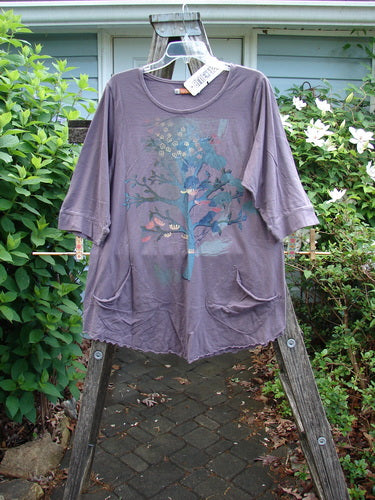 Barclay NWT Banded Artist Pocket Top Bonsai Tree Aura Size 1 features a rounded neckline, A-line shape, double diagonal pockets, three-quarter banded sleeves, with a bonsai tree pattern and rounded hemline.