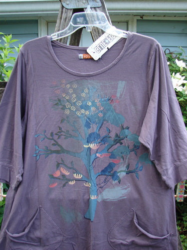 Barclay NWT Banded Artist Pocket Top Bonsai Tree Aura Size 1, showcasing a rounded neckline, A-line shape, double diagonal pockets, banded three-quarter sleeves, bonsai tree pattern, and curly-edged hemline.