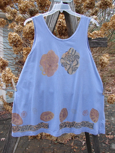 1993 Solo Tank Wonderland Periwinkle OSFA: A blue tank top with brown designs on a wooden pole. Features a unique vertical center front seam and a diagonal rear seam creating a back swing. Bust 52, Waist 54, Hips 56, Length 32 inches.