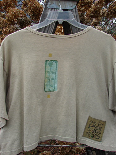 1992 Short Sleeved Crop Tee Top Frog Camino OSFA: A vintage t-shirt with a jumping frog theme paint design and a slightly thicker rolled neckline adorned with stamp accents.