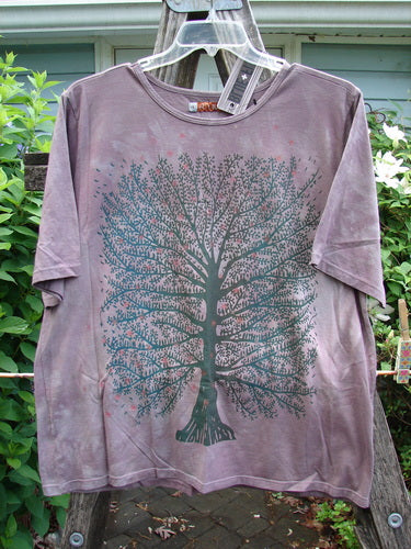 Barclay NWT Fiona Straight Tee in Tree Star design, Mottled Grey Plum, features a rounded flattened neckline, shorter wide sleeves, and a generous straight shape. Perfect for expressing individual style.