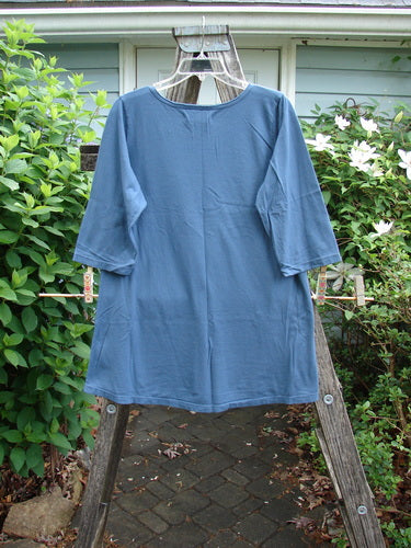 Barclay NWT Simple Short Sleeved A Lined Tee features a rounded neckline, wide sleeves, and A-lined shape, adorned with a fish theme, embodying BlueFishFinder's unique vintage style.