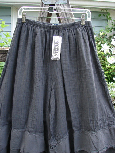 Barclay NWT Gauze Wide Leg Carassai Pant in Unpainted Stripe Coal Carbon, featuring unique stacked bottom flutters, full elastic waistline, and extra wide lowers, embodying BlueFishFinder's vintage creative style.