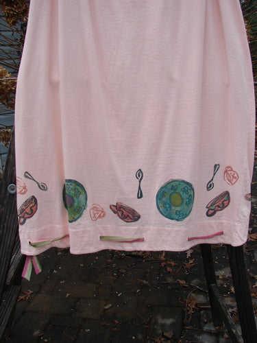1992 Buttonloop Skirt with a unique breakfast diner theme paint, made from medium weight cotton. Features a full drawcord waist and a varying hemline.
