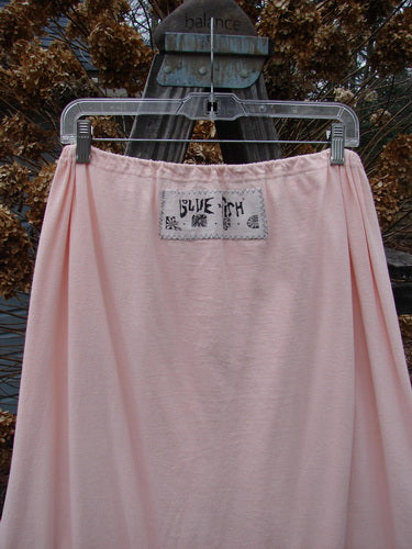 1992 Buttonloop Skirt on clothes line with hand-dyed silk ribbon and breakfast diner theme paint