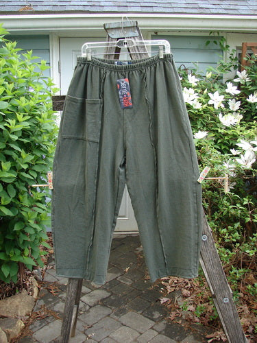 Barclay NWT Rib Single Pocket Exterior Stitch Work Pant Unpainted Army Size 0 features a full elastic waist, singular top pocket, wide legs, and vertical stitchery, showcasing vintage Blue Fish style.