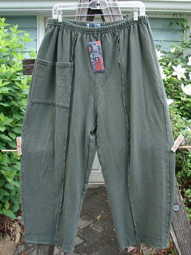 Barclay NWT Rib Single Pocket Exterior Stitch Work Pant Unpainted Army Size 0, showcasing a full elastic waistline, wider legs, singular exterior pocket, and distinctive vertical stitchery, embodying BlueFishFinder's vintage creative freedom.