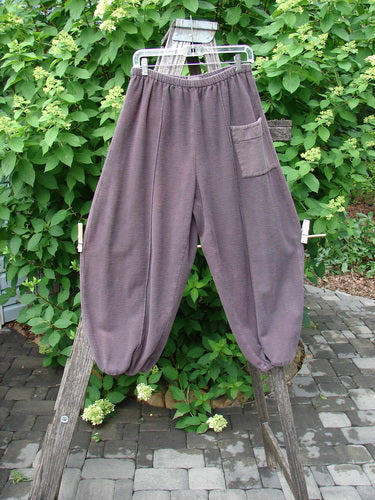 2000 Flannel Antoen Pant Unpainted Brum Size 1, loose-fitting with elastic waistband and ankles, single thigh pocket, displayed on a ladder, showcasing its vintage charm and unique design from Bluefishfinder.com.