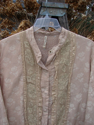 Magnolia Pearl European Cotton Snap A Line Cardigan with lace trim and mandarin collar, featuring a floral mix print interior and exterior.