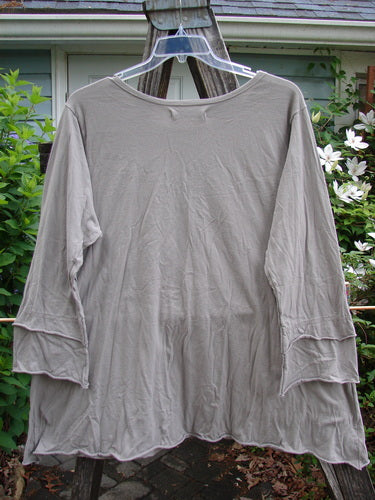 Barclay Petal Sleeved A Line Tunic Floral Dawn Sand Size 1, featuring a rounded neckline, thick double petal sleeves, and a generous A-line shape, showcasing BlueFishFinder's vintage-inspired organic cotton design.