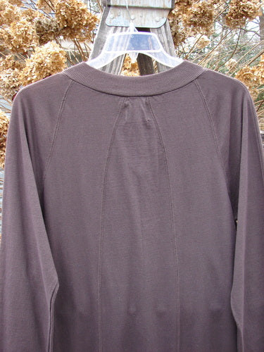 1999 Wide V Neck Dress Rocking Horse Currant Size 1: Slimmer-shaped dress with ribbed V neckline and sectional panels.