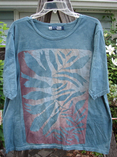 Barclay Fiona Straight Tee Curl Fern in Mottled Green Leaf, featuring a rounded neckline, wide sleeves, and a generous straight shape, embodies Bluefishfinder's vintage, creative fashion ethos.