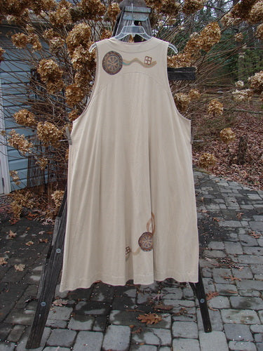 1996 State Fair Vest Abstract Wheel Dune Size 2: A white dress on a rack, with a close-up of a dress. Clothing, outdoor, wedding dress, dress, standing.