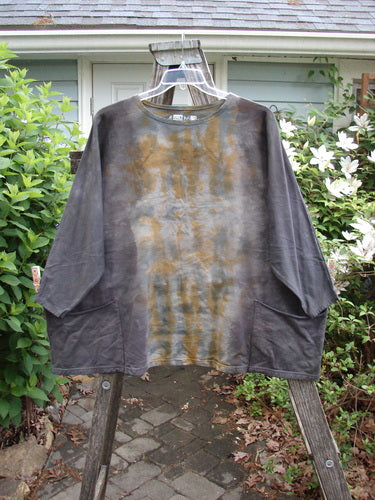 Barclay Cotton Lycra Writer's Pocket Pullover Sweatshirt in Mottled Sunset features a seamless front, wide square flair, dual drop pockets, and stretchy sleeves, embodying Bluefishfinder.com's vintage style and creative expression.