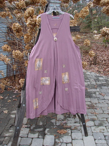 1996 State Fair Vest with oversized button and double paneled hemline, made from organic cotton. Features a swing design and pine twig theme paint.