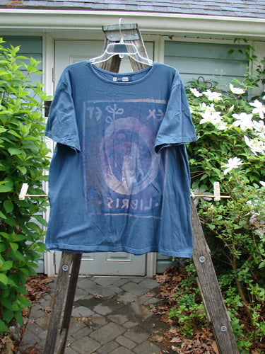 Barclay Fiona Straight Tee Ex Libris Window Pane Size 0 features a rounded, flattened neckline, shorter wide sleeves, and a straight, generous shape, crafted from medium-weight organic cotton.
