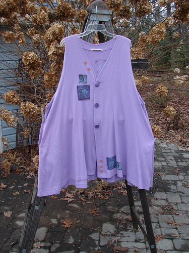 1997 Simple Vest Quad Night Atom Freesia Size 2: Swing vest with deep side pockets and oversized knotted buttons.