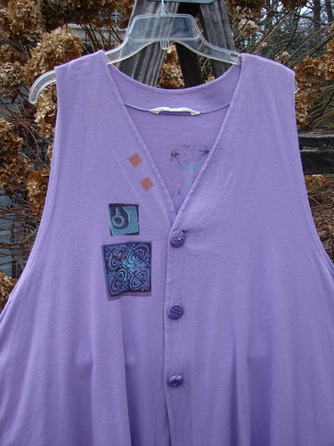 1997 Simple Vest Quad Night Atom Freesia Size 2: Swing vest with knotted buttons and Blue Fish patch on lower back.
