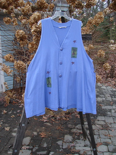 1997 Simple Vest Lamp Chair Skylark Size 2: Swingy blue vest with star pattern, deep pockets, and oversized buttons.