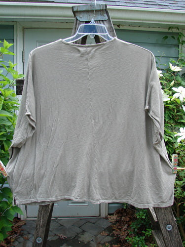 Barclay Cotton Slub Cricket Cap Sleeve Tee Dogwood Faun OSFA features cap sleeves, a rounded hemline, and seamless shoulders, showcasing a unique Dogwood Garden theme in a square, boxy shape.
