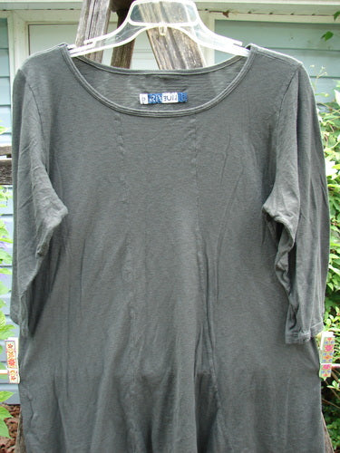 Barclay Slub New Hope Curve Seam Tee in Deepest Forest, featuring three-quarter sleeves, lower hip flare, and dual curved seams, crafted from lightweight organic cotton slub, size 0, unpainted, 27-inch length.