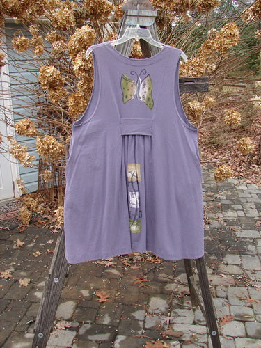 1996 Moonsmile Vest with butterfly motif on purple dress