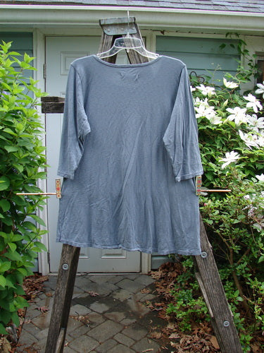 Barclay Slub New Hope Curve Seam Tee Secret Symbol Grey Size 1 features three-quarter sleeves, a rounded hem, and dual curved seams, highlighting the store's vintage, creative expression ethos.