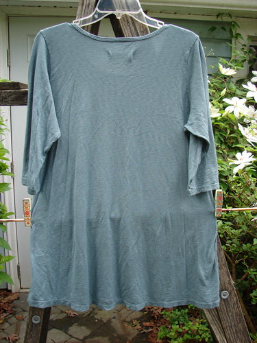 Barclay Slub New Hope Curve Seam Tee in Lightest Forest, featuring three-quarter sleeves, dual curved seams, and a rounded hemline, showcasing the Travel Notes theme. Size 1, ideal for expressing individuality.