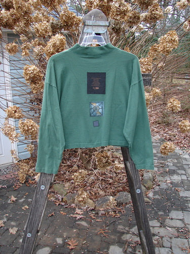1997 Structure Tee Top with flying bird house theme on a swinger