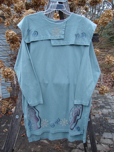 1996 Trifocal Top Celestial Trinket Size 1: A funky, long-sleeved blue shirt with an abstract forest design and Blue Fish patch.