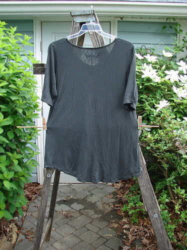Barclay Slub Curve Bottom Tee Single Floral Black Size 1 features a rounded neckline, short sleeves, and an A-line shape with a unique rounded hemline, embodying vintage Blue Fish Clothing creativity.