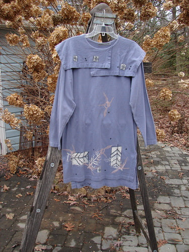 1996 Trifocal Top Arrow Stratus Size 1: Long-sleeved shirt with abstract arrow theme paint and fish patch on hem.